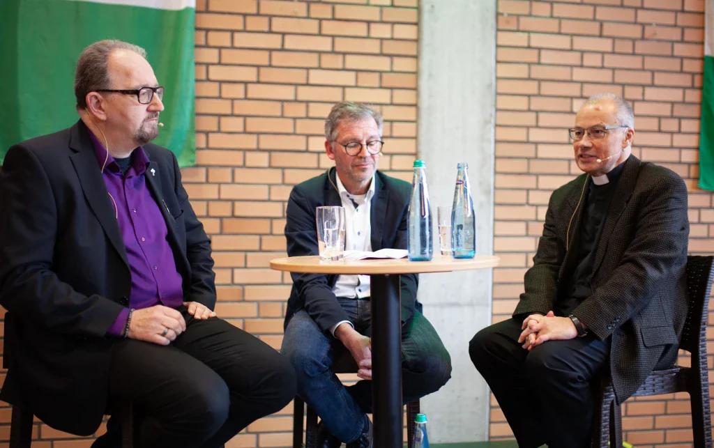 2024: Podiumsdiskussion mit Marco Beuermann (Pfarrer der ev. Versöhnungskirchengemeinde Rheda-Wiedenbrück & Notfallseelsorger) und dem ehemaligen Bezirkspräses Rüdiger Rasche
